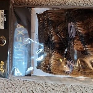 New clip in hair extensions